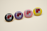 TMAS Logo Pin 4-pack angled view