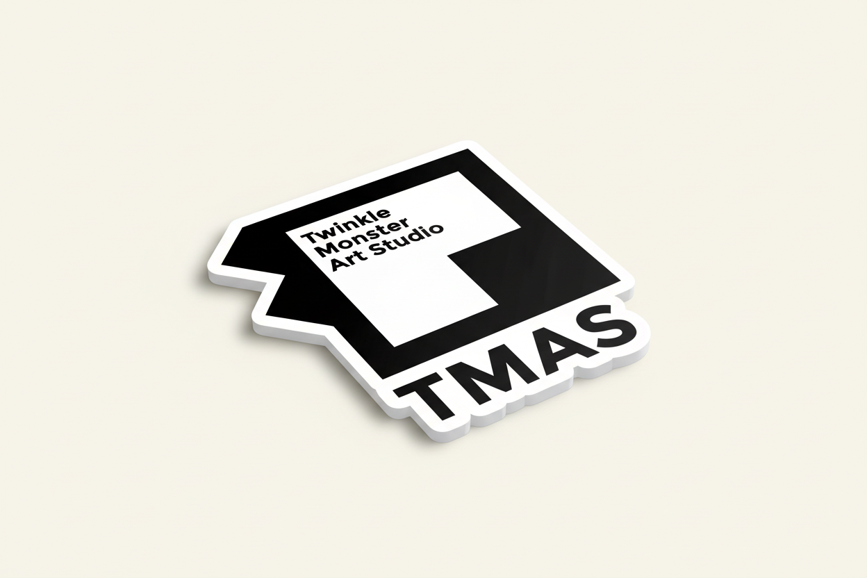 TMAS logo magnet - angled view