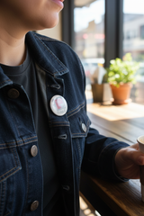TMAS Logo Pin lifestyle shot