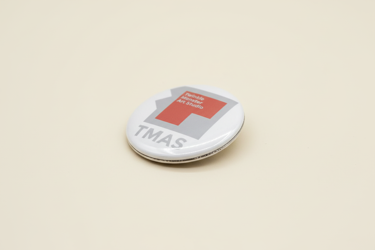 TMAS Logo Pin angled view